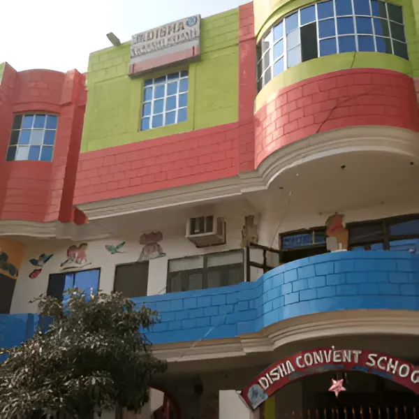 Colorful exterior of Disha Convent School building with painted walls, windows, and a visible school name board